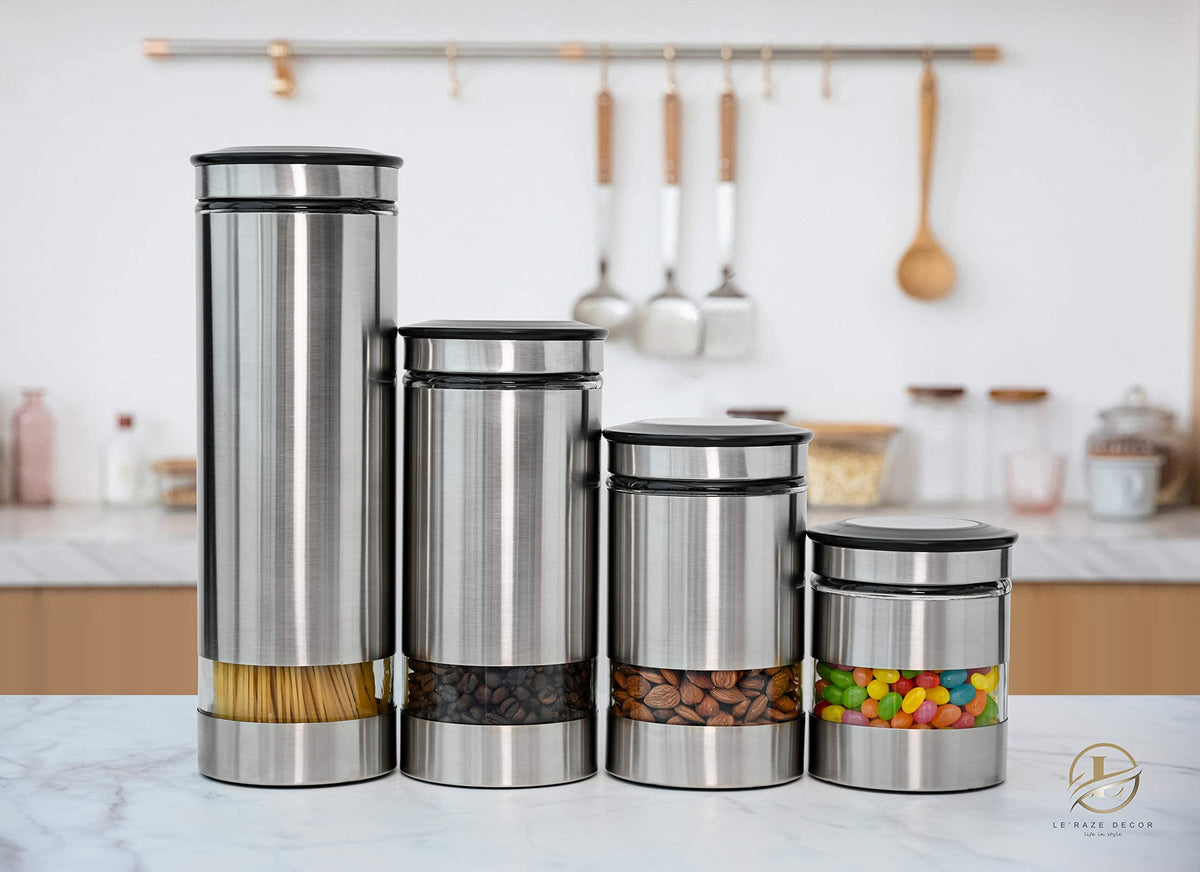 Le'raze Airtight Glass Canister Set of 4 with Stainless Steel Sleeve for Kitchen Counter - Food Storage Containers with Glass Window and Airtight Lids - Pantry Storage and Organization Set