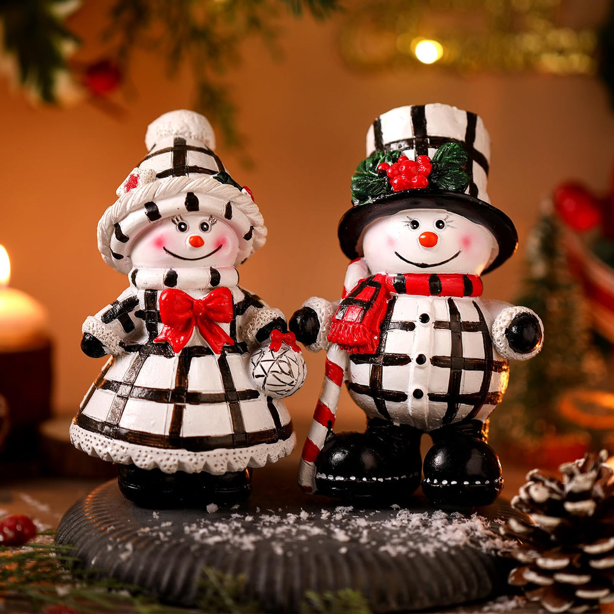 Moucuny 2 Pieces Winter Snowman Figurines Decorations Black and White Resin Snowman Winter Ornaments with Chef Hat Candy Bow Scarf Table Decor for Tabletop Office Shelf Gift Home Kitchen Mantle