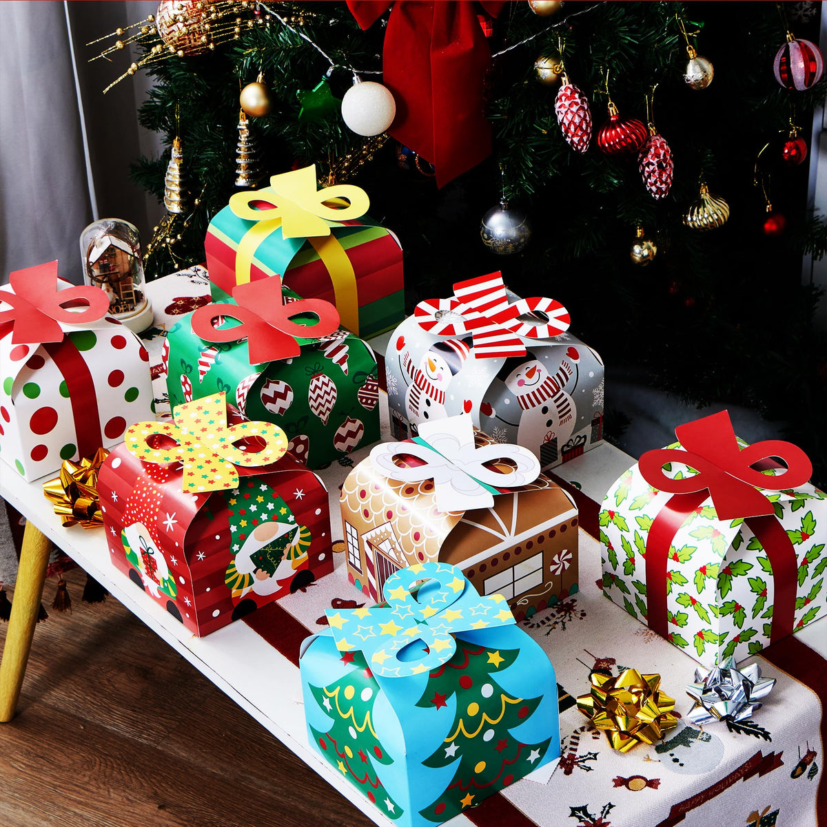 JOYIN 24 PCS 3D Christmas Goody Gift Boxes with Bow for Holiday Xmas Goodie Paper Boxes, School Classroom Party Favor Supply, 6” x 6” x 5.5” 8 Designs Candy Treat Cardboard Cookie Box for Gift Giving